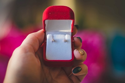 Earring in a red casing